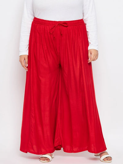 Red Solid Rayon Flared Sharara with elasticated waistband and drawstring.