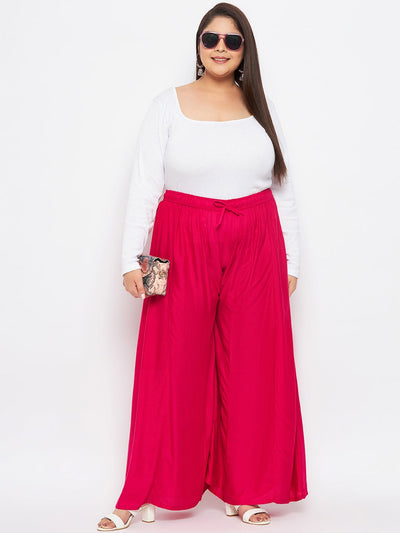 Magenta Solid Rayon Flared Sharara with elasticated waistband and drawstring.