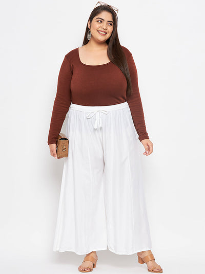 White Solid Rayon Flared Sharara with Elasticated Waistband and Drawstring.