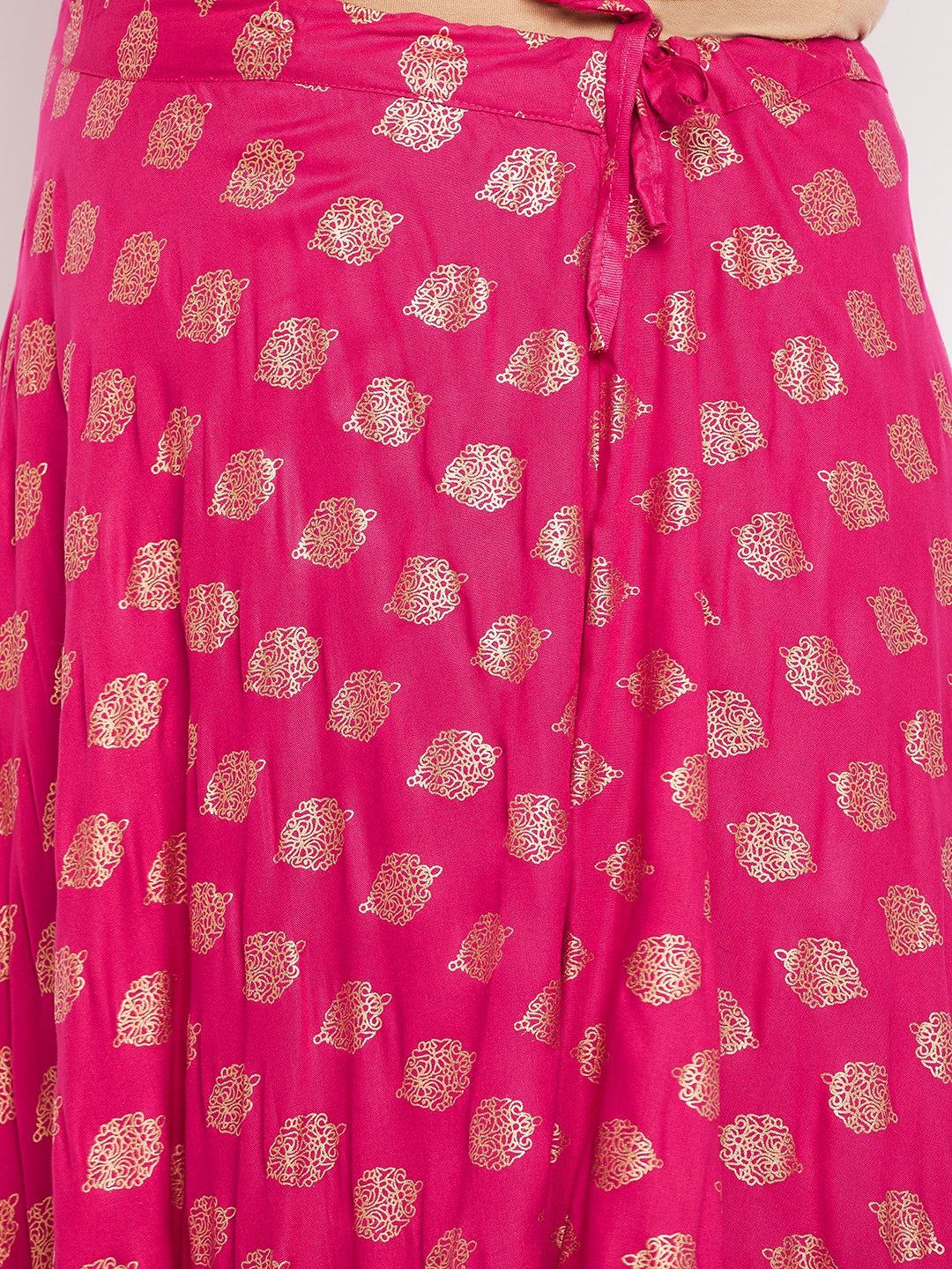 Magenta printed flared rayon skirt with drawstring waistband.