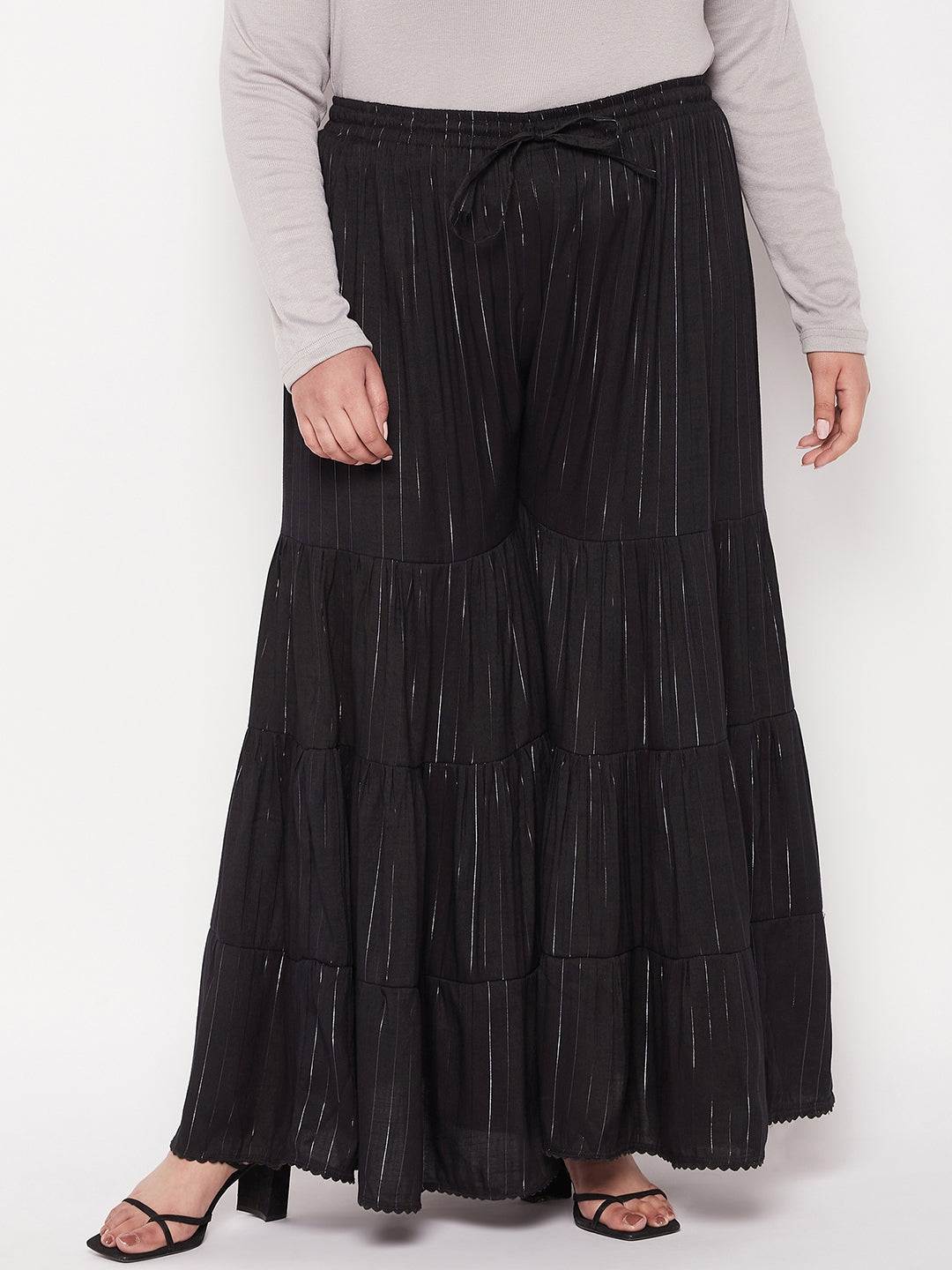 Black striped rayon flared gharara with elastic waistband and drawstring.
