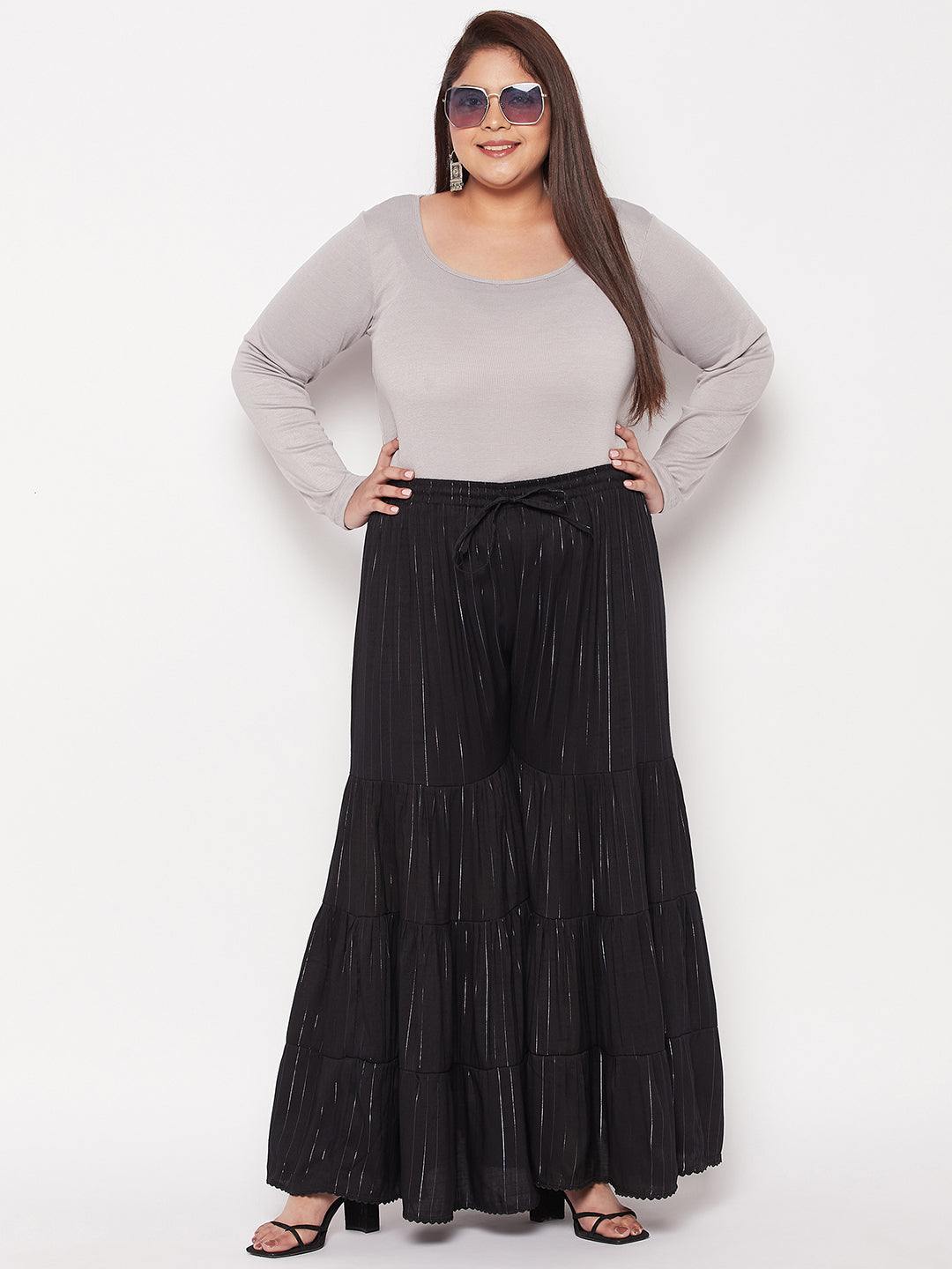 Black Striped Rayon Flared Gharara with elasticated waistband.