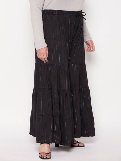 Black striped rayon flared gharara with elasticated waistband and drawstring.