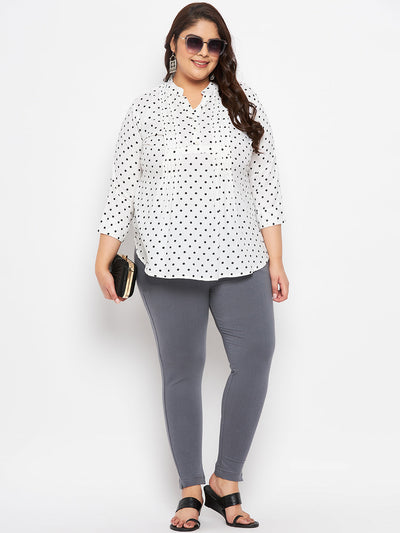Grey solid ankle length leggings with elasticated waistband, regular fit.