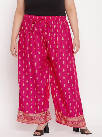 Magenta printed wide leg rayon palazzo with elastic waistband and drawstring.