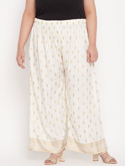 Cream printed wide leg rayon palazzo with drawstring waistband.