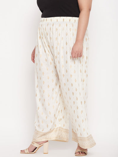 Cream printed wide leg rayon palazzo with elasticated waistband and drawstring.