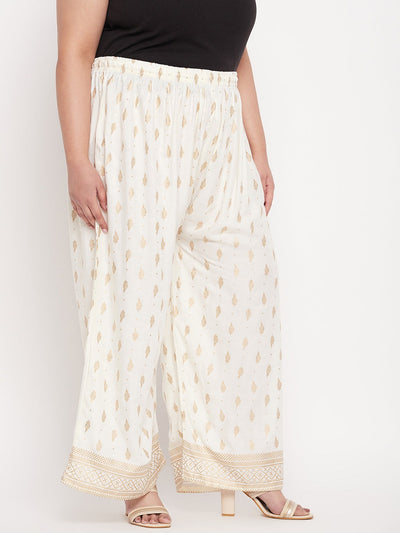 Cream printed wide leg rayon palazzo with elasticated waistband and drawstring.
