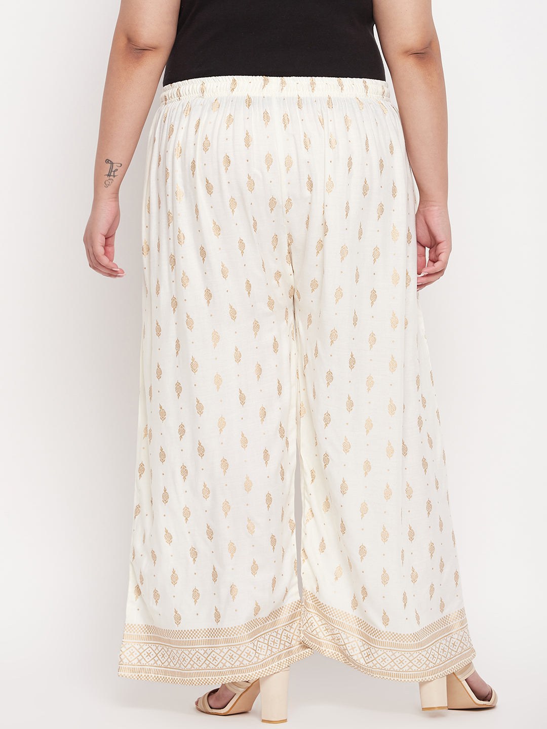 Cream Printed Wide Leg Rayon Palazzo with elasticated waistband and drawstring.
