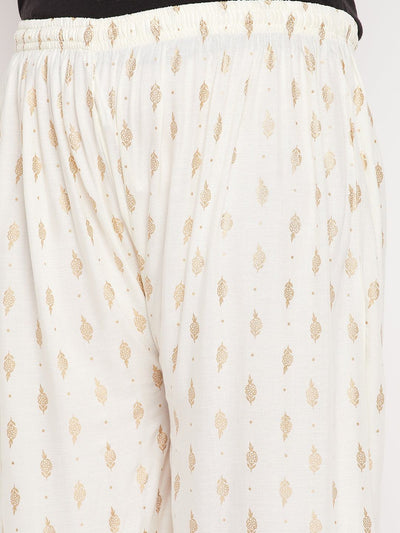 Cream printed wide leg rayon palazzo with elasticated waistband and drawstring.