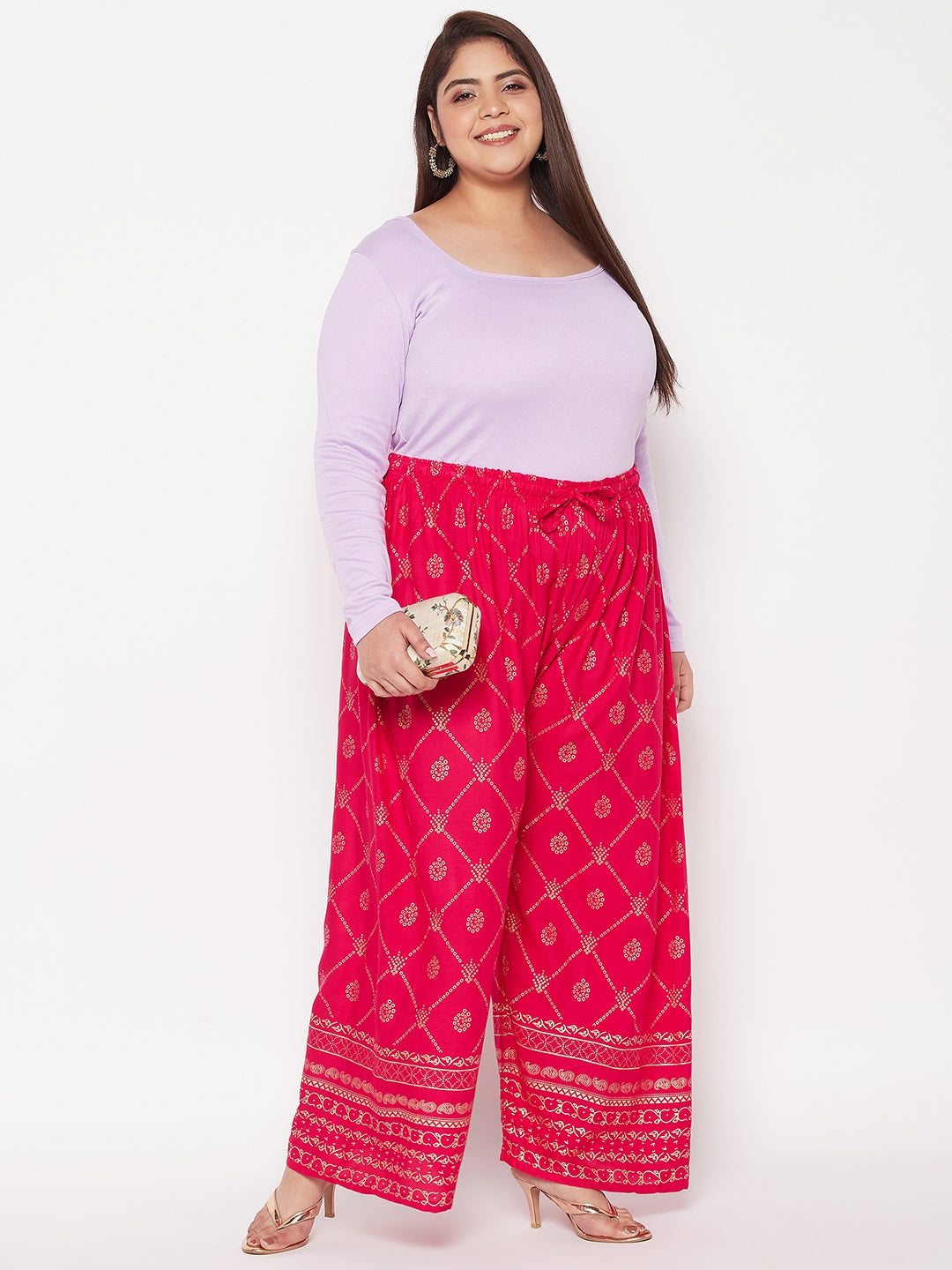 Magenta printed rayon palazzo with elasticated waistband and drawstring.