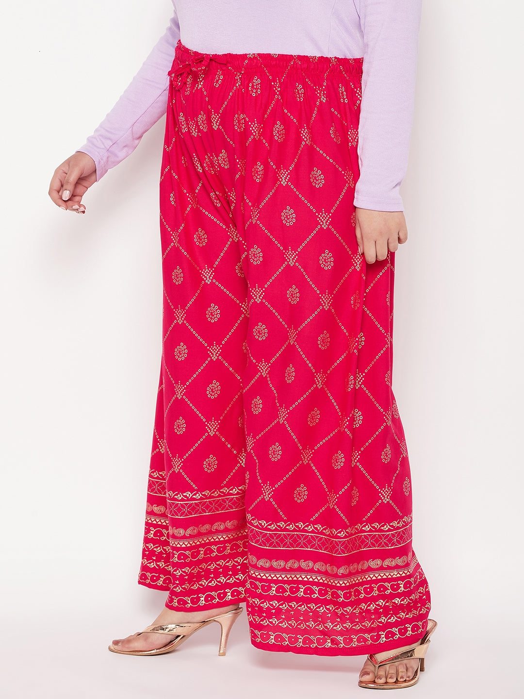 Magenta printed rayon palazzo with elasticated waistband and drawstring.