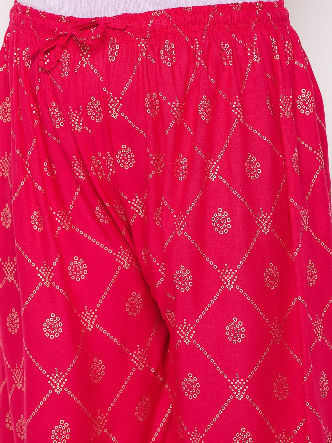 Magenta printed rayon palazzo with elasticated waistband and drawstring.