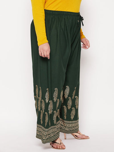 Bottle green printed wide leg rayon palazzo with elasticated waistband and drawstring.