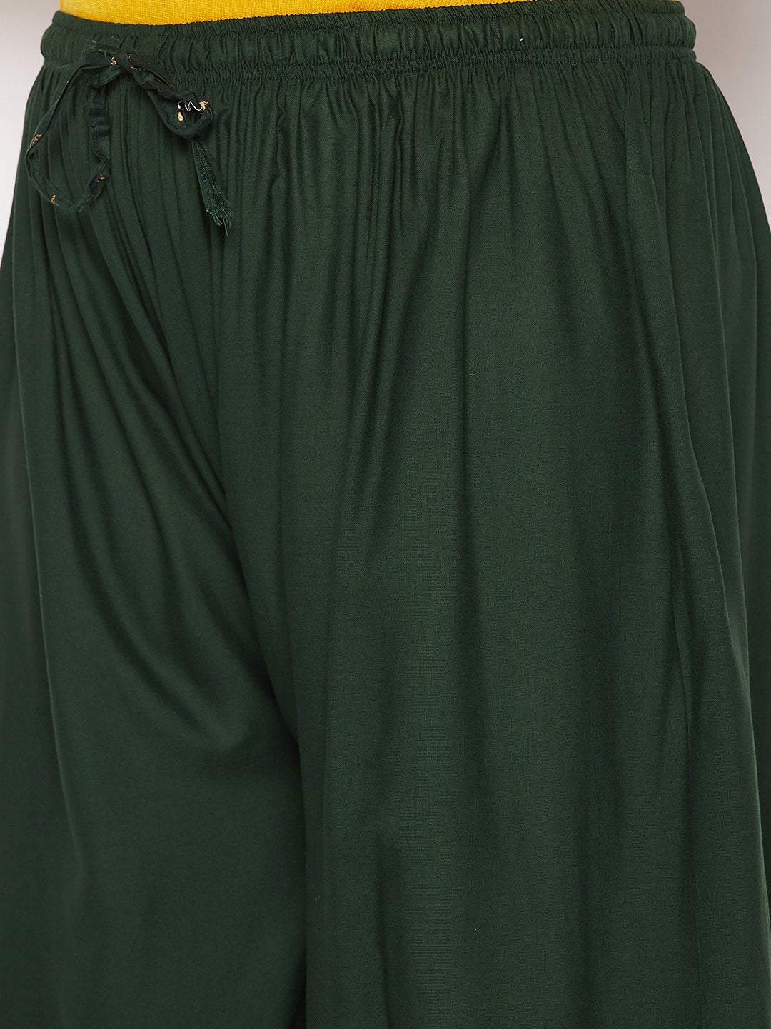Bottle Green Printed Rayon Palazzo with elasticated waistband and drawstring.