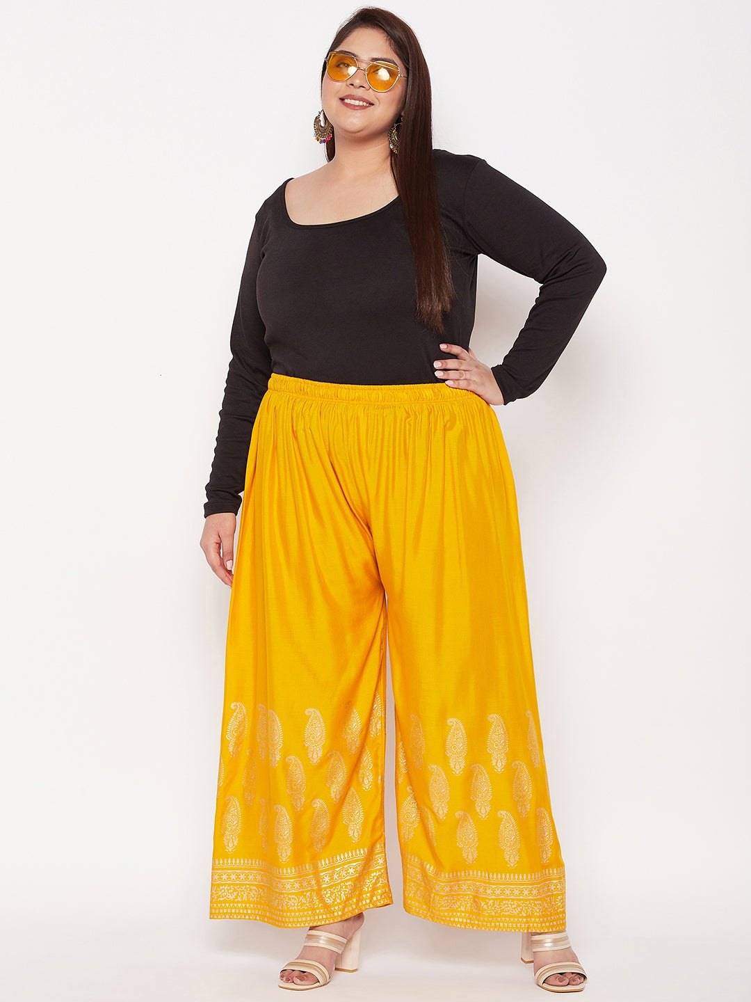 Mustard printed rayon palazzo with elasticated waistband and drawstring.