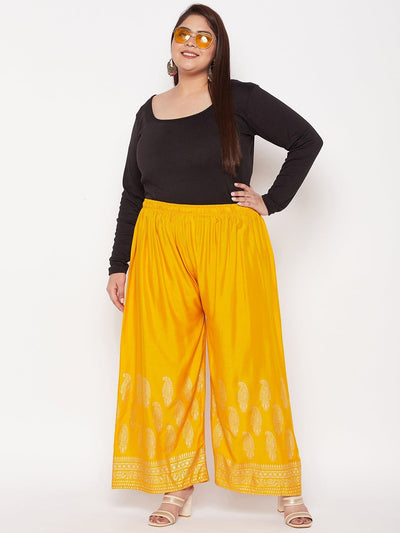 Mustard printed rayon palazzo with elasticated waistband and drawstring.