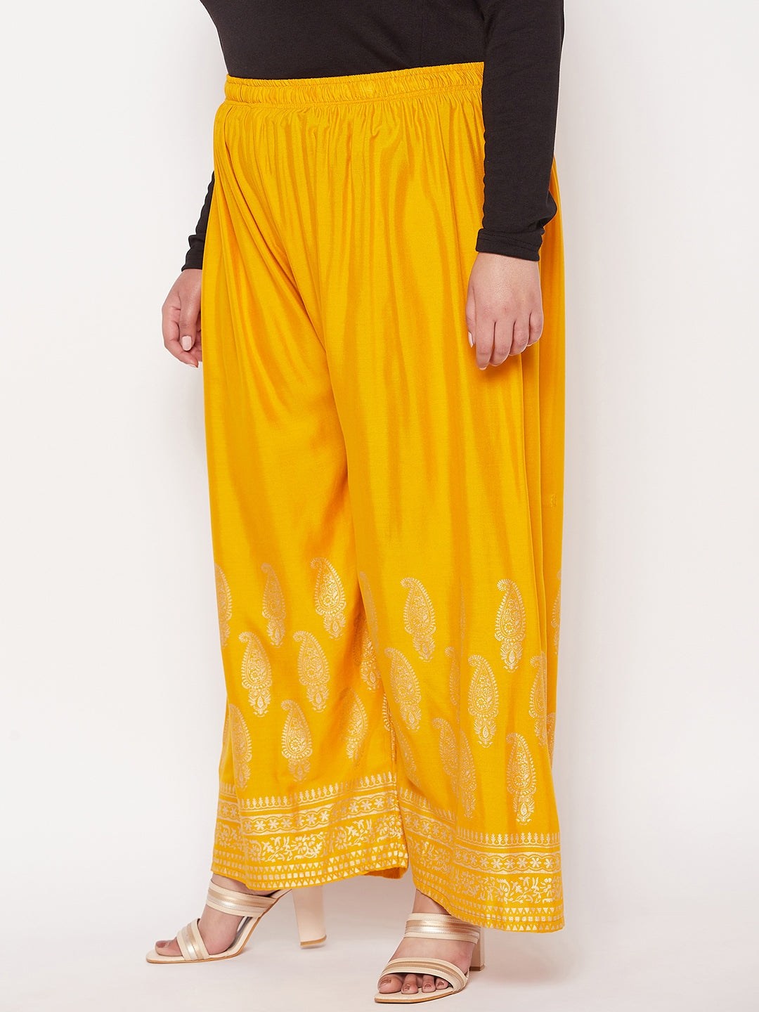 Mustard printed rayon palazzo with elasticated waistband and drawstring.