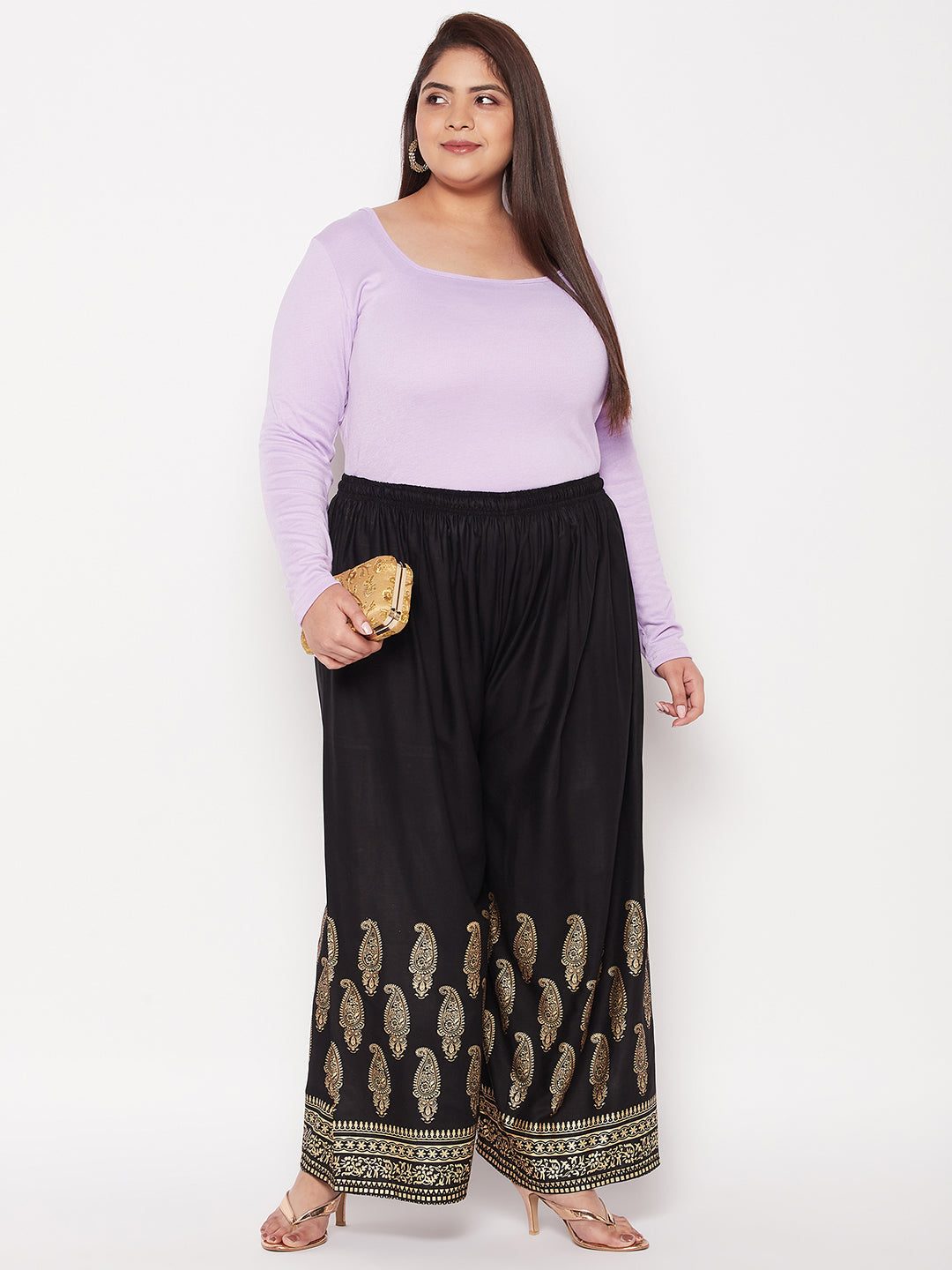 Black printed rayon palazzo pants with elasticated waistband and drawstring.