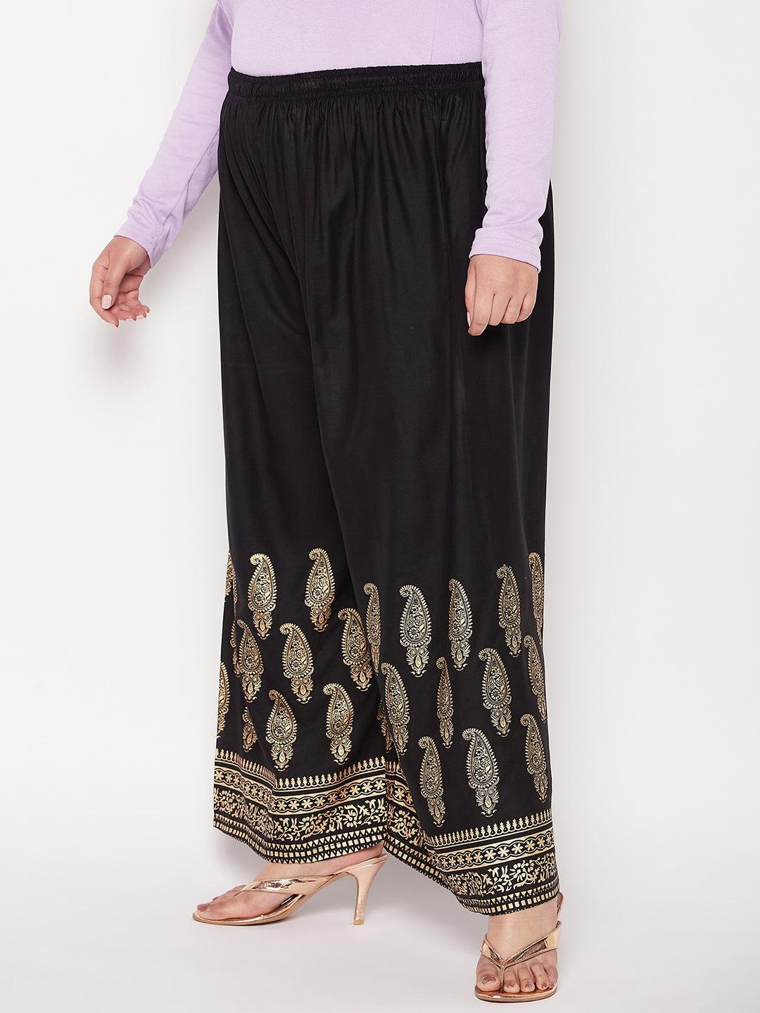 Black printed rayon palazzo with elasticated waistband and drawstring.
