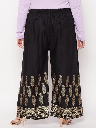 Black printed rayon palazzo with paisley design and elastic waistband.