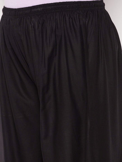 Black printed rayon palazzo with elastic waistband and drawstring.