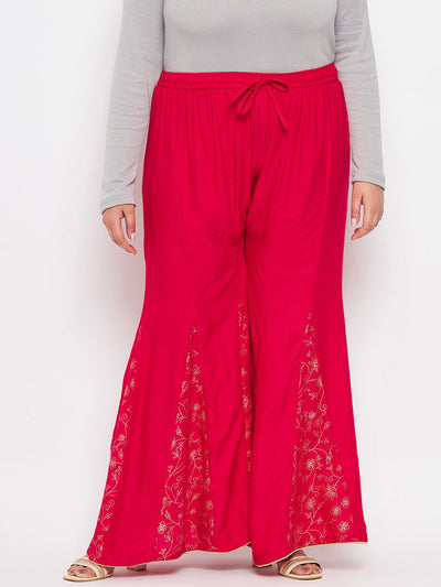 Magenta printed rayon flared sharara with elasticated waistband and drawstring.