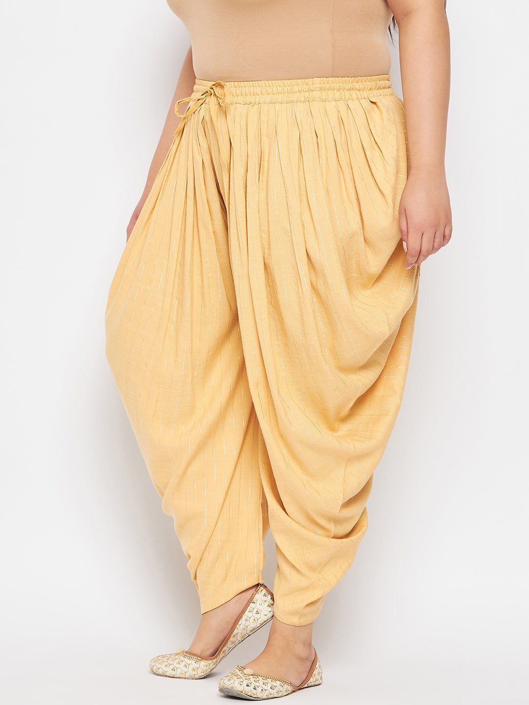 Fawn striped rayon dhoti salwar with elasticated waistband and drawstring.