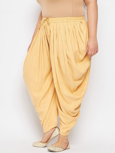 Fawn striped rayon dhoti salwar with elasticated waistband and drawstring.