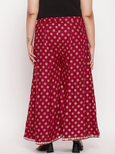Maroon polka dot rayon sharara with elasticated waistband and drawstring.
