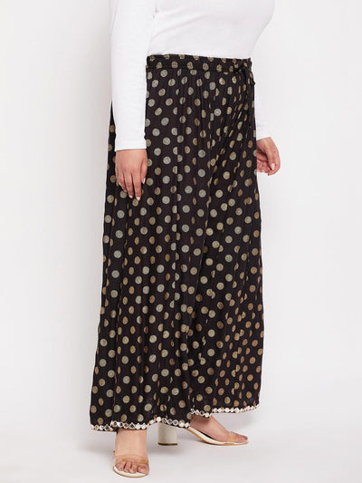 Black polka dot rayon sharara with elastic waistband and drawstring.
