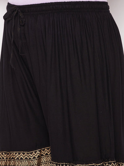 Black printed rayon flared Gharara with elasticated waistband and drawstring.