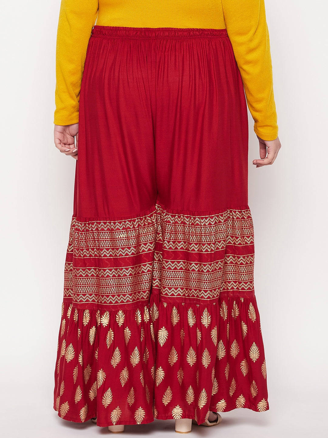 Maroon printed rayon flared gharara with elastic waistband and drawstring.