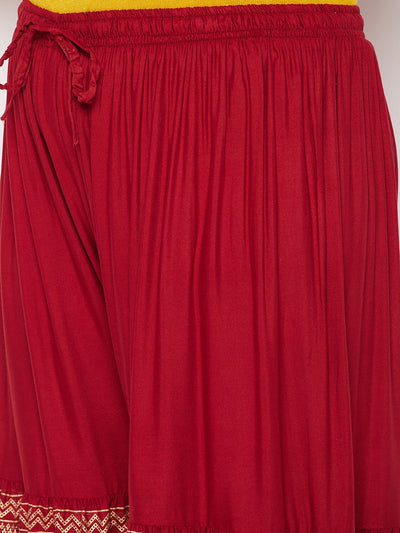 Maroon printed rayon flared gharara with elastic waistband and drawstring.