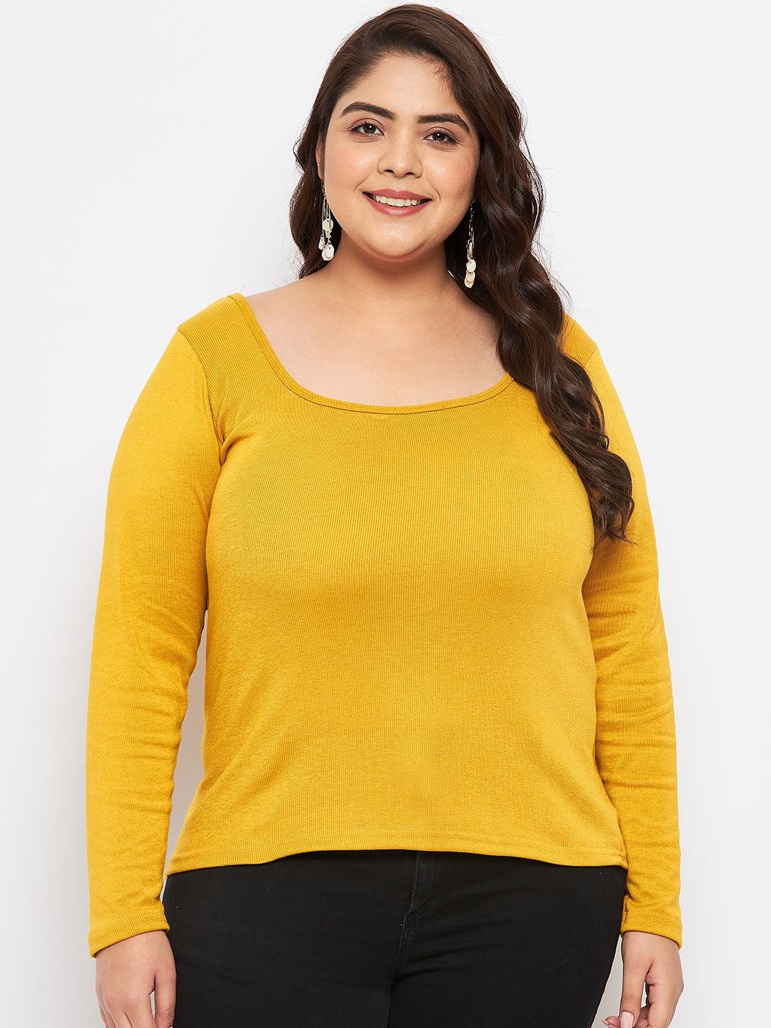 Mustard solid full sleeves top made of polyester, cotton, and elastane.