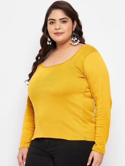 Mustard solid full sleeves top made of polyester, cotton, and elastane.