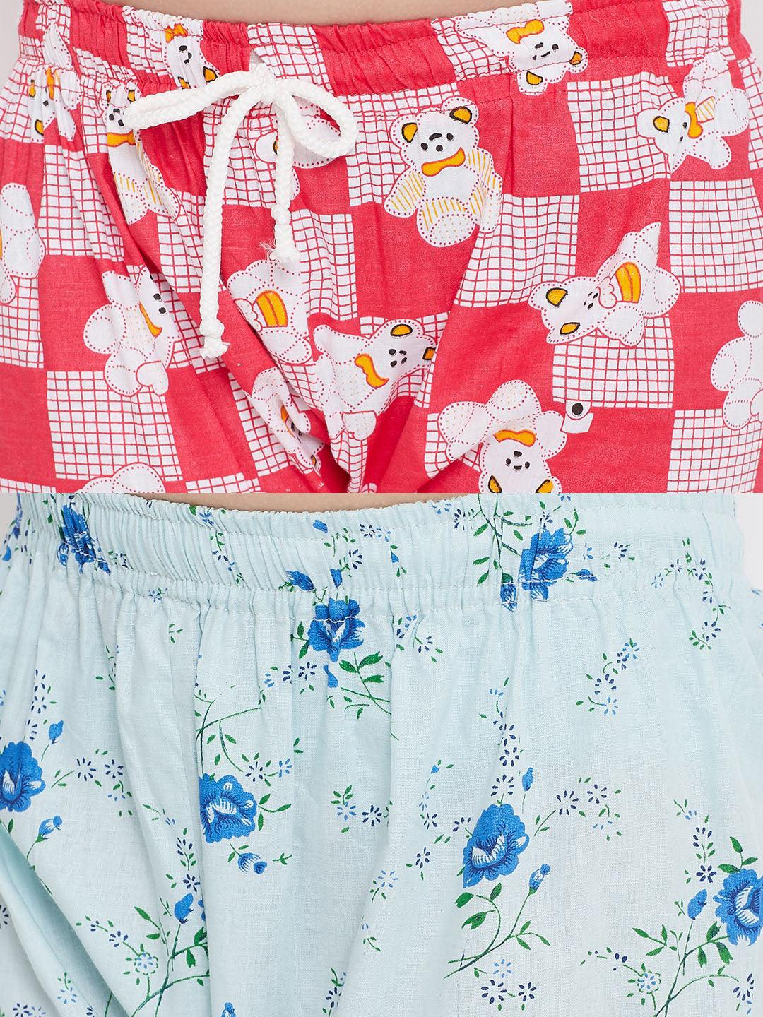 Red and blue printed rayon night suit set for girls featuring playful designs.