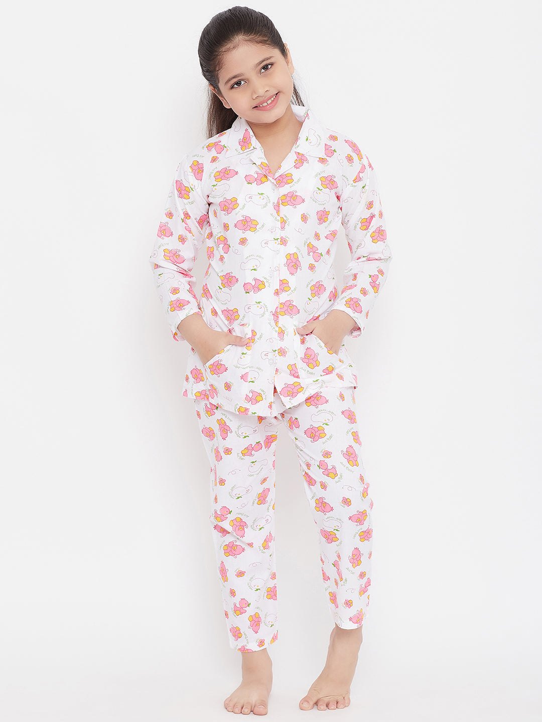 White and peach printed rayon nightsuit, pack of 2, displayed on child model.