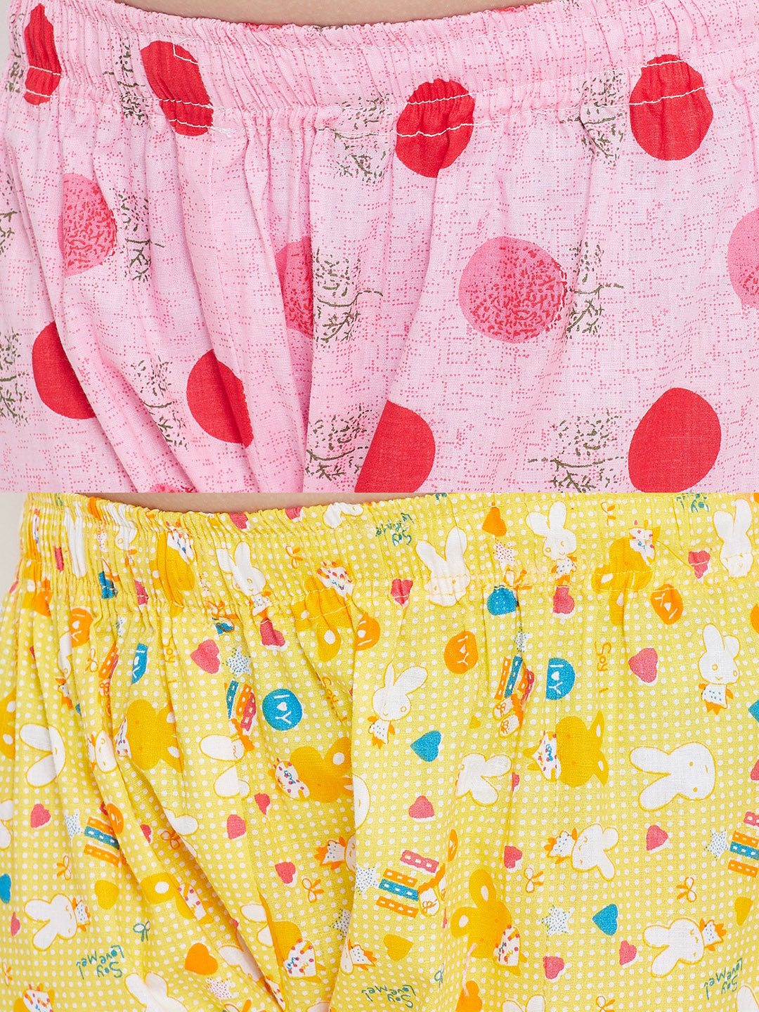 Pink and yellow printed rayon nightsuit pack of 2 with playful patterns.