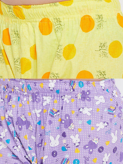 Yellow and purple printed rayon nightsuit set with playful patterns.